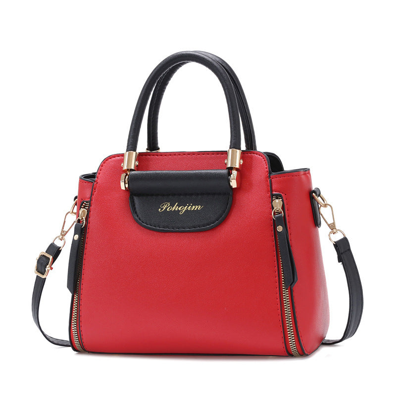 Stylish Korean colorblock handbag with gold accents, large capacity, perfect for shoulder or crossbody use.