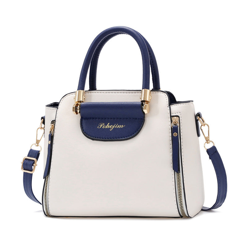 Stylish Korean colorblock handbag with gold accents, large capacity, perfect for shoulder or crossbody use.